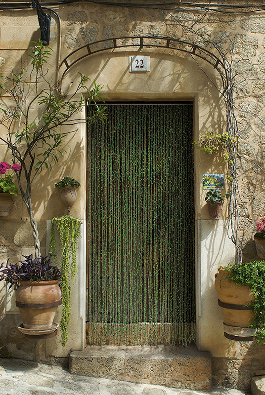 Rideau de porte torsades de polyester et feuillage artificiel - Samana